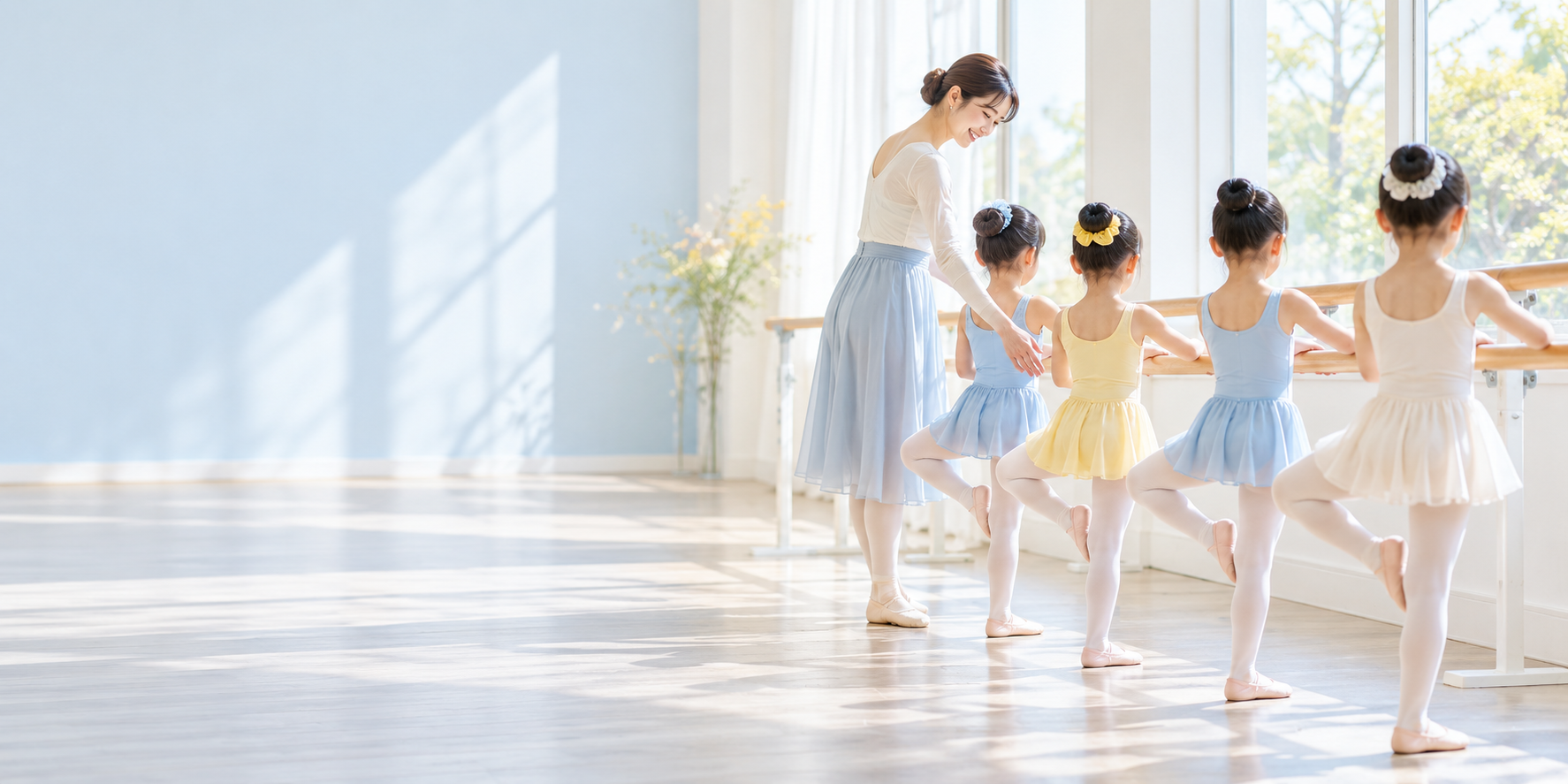 明るいスタジオでバレエを楽しむ子どもたちのイメージ画像